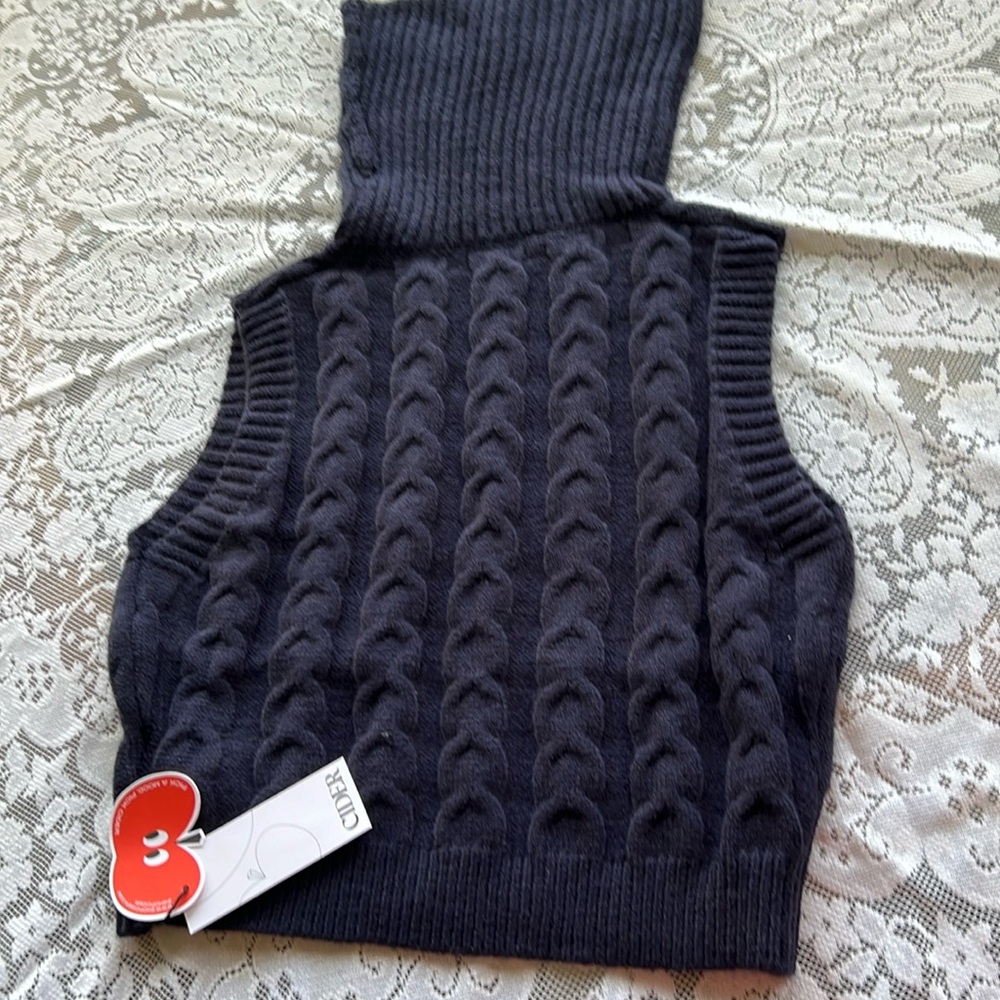 Short women top. New. With tags attached